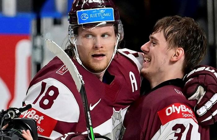 Latvia celebrates team morale after the victory against Sweden in the Hockey World Cup